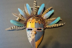 Southwestern gourd mask artwork with painted geometric patterns by Donna Vargas