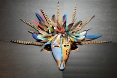 Southwestern gourd mask artwork with painted geometric patterns by Donna Vargas