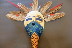 Southwestern gourd mask artwork with painted geometric patterns by Donna Vargas