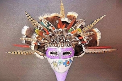 Southwestern gourd mask artwork with painted geometric patterns by Donna Vargas