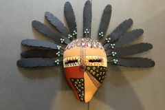 Southwestern gourd mask artwork with painted geometric patterns by Donna Vargas