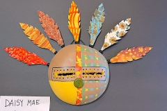 Southwestern gourd mask artwork with painted geometric patterns by Donna Vargas
