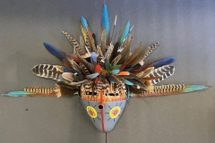 Southwestern gourd mask artwork with painted geometric patterns by Donna Vargas