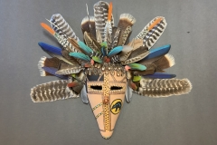 Southwestern gourd mask artwork with painted geometric patterns by Donna Vargas