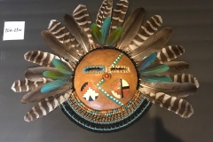 Southwestern gourd mask artwork with painted geometric patterns by Donna Vargas