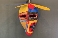 Southwestern gourd mask artwork with painted geometric patterns by Donna Vargas