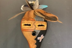 Southwestern gourd mask artwork with painted geometric patterns by Donna Vargas