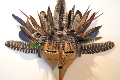 Southwestern gourd mask artwork with painted geometric patterns by Donna Vargas