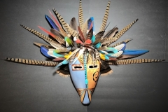 Southwestern gourd mask artwork with painted geometric patterns by Donna Vargas