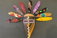 Southwestern gourd mask artwork with painted geometric patterns by Donna Vargas
