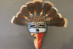 Southwestern gourd mask artwork with painted geometric patterns by Donna Vargas