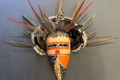 Southwestern gourd mask artwork with painted geometric patterns by Donna Vargas