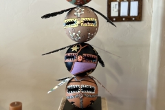 Decorative gourd totem sculpture by Tucson artist Donna Vargas