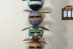 Decorative gourd totem sculpture by Tucson artist Donna Vargas