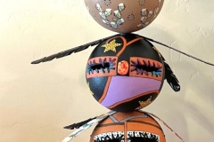 Decorative gourd totem sculpture by Tucson artist Donna Vargas
